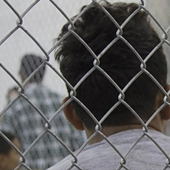 A migrant or asylum seeker in a detention center